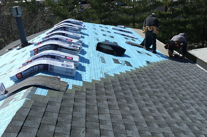 New shingle installation in progress
